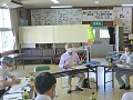 取組について語る佐藤会長（中央）