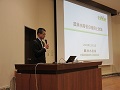 説明する西地方参事官
