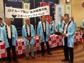 挨拶する實井局次長
