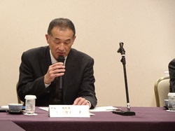 講演を行う田口地方参事官