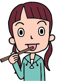舐り箸をする女の子