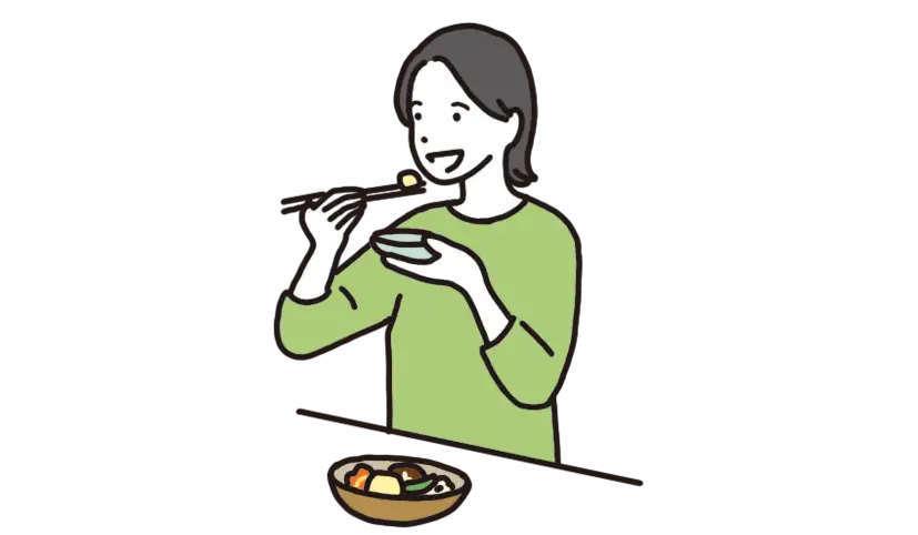 小皿を使って食べる女性