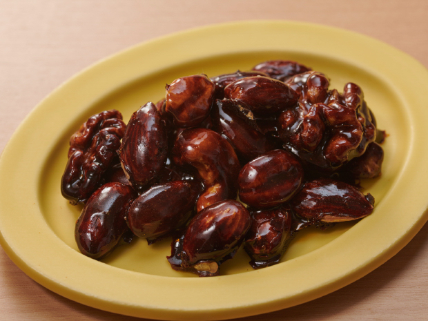 Nuts coated with brown sugar