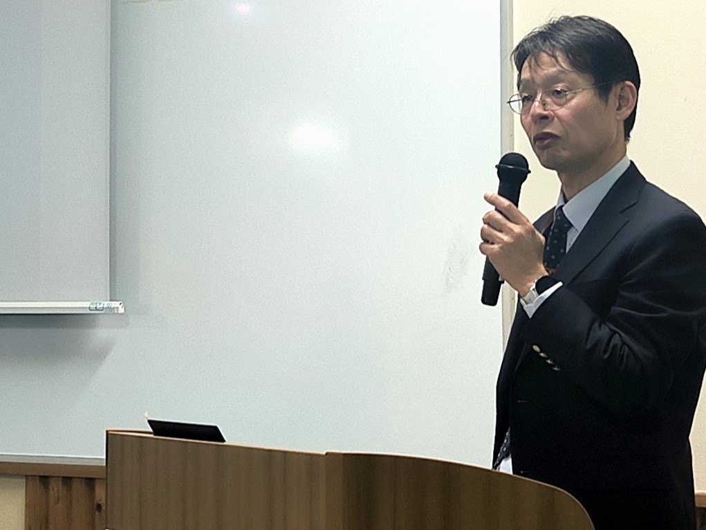 会場での投影資料の写真