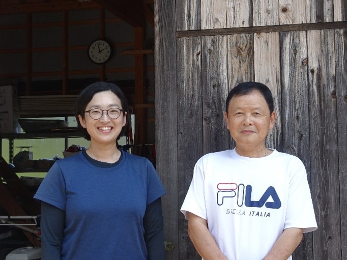江里口棚田保全組合長と地域おこし協力隊の田中さん
